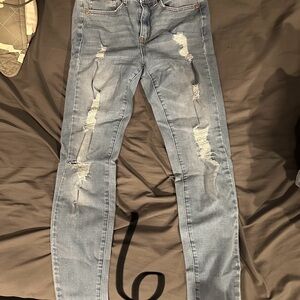 Women's Distressed Blue Jeans